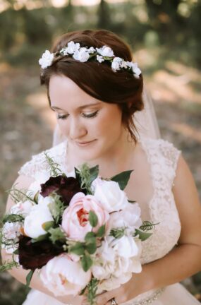 Bride Holding Her Bouquet - we are an Orlando Wedding Photographer offering professional wedding photo and video.