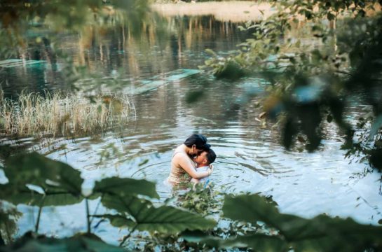 This is an image of a couple having their engagement photos done at rainbow springs by Daylin Lavoy Photography a local Engagement Photographer based in Orlando Fl. This couple wanted to get inside the river at Rainbow Springs for a 