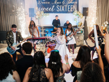 Orlando Wedding photographer Daylin Lavoy captures a sweet 16 photo of the birthday girl rocking out on stage with her band at a local Orlando Venue.