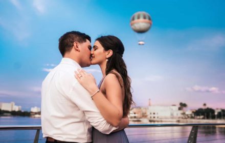 Tatianna & Oritos Engagement Session Disney Springs A couple embracing together during an engagement photography session.