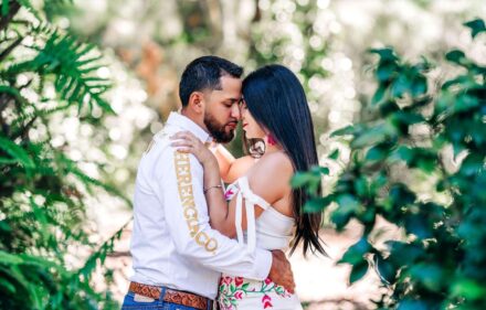 Couple kissing and having fun at one of the many engagement photography locations at Bok Tower Gardens located near Lakeland FL